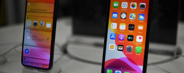 Старт продаж новых iPhone в России Старт продаж новых iPhone в России - Sputnik Ўзбекистон