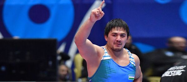 Хасанбой Рахимов завоевал путевку на Олимпиаду-2020 Хасанбой Рахимов завоевал путевку на Олимпиаду-2020 - Sputnik Узбекистан