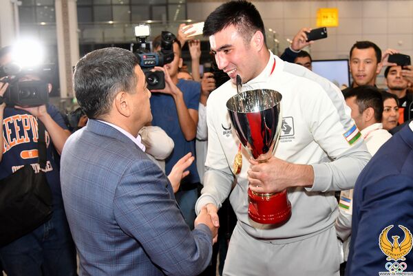 Лучшие в мире: как встречали узбекских боксеров - фото - Sputnik Узбекистан