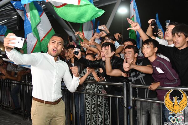 Лучшие в мире: как встречали узбекских боксеров - фото - Sputnik Узбекистан