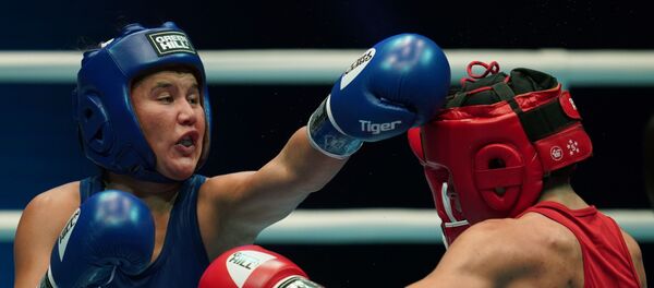 Справа налево: Кэролайн Вейре (Канада) и Ёдгорой Мирзаева (Узбекистан) Справа налево: Кэролайн Вейре (Канада) и Ёдгорой Мирзаева (Узбекистан) - Sputnik Ўзбекистон