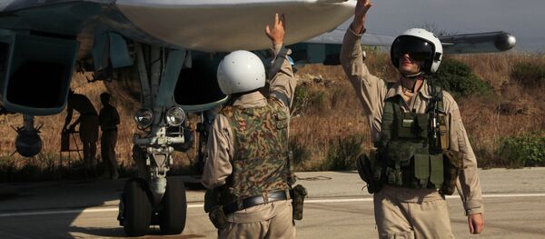 Российская боевая авиация на аэродроме Хмеймим в Сирии Российская боевая авиация на аэродроме Хмеймим в Сирии - Sputnik Ўзбекистон