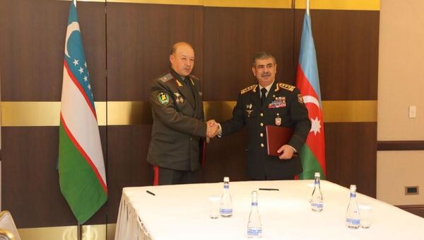 Главы оборонных ведомств Узбекистана и Азербайджана подписали план взаимного военного сотрудничества - Sputnik Ўзбекистон