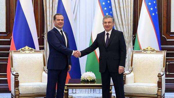 Президент Узбекистана Шавкат Мирзиёев и председатель правительства РФ Дмитрий Медведев - Sputnik Узбекистан