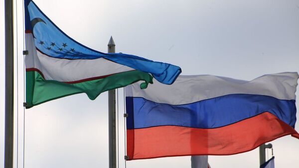 Флаги Узбекистана и России - Sputnik Узбекистан