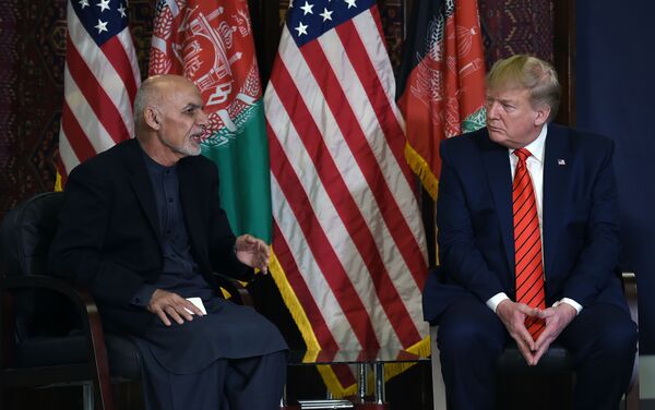 Президент США Дональд Трамп во время визита в Афганистан - Sputnik Узбекистан