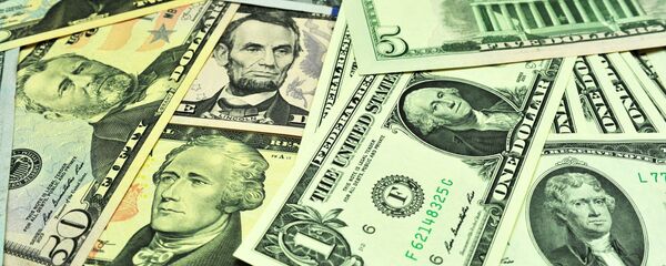 Банкноты долларов США различного достоинства - Sputnik Ўзбекистон