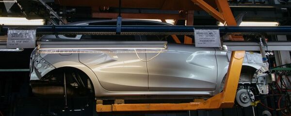 Сборка новых автомобилей на заводе. Архивное фото Сборка новых автомобилей на заводе. Архивное фото - Sputnik Ўзбекистон