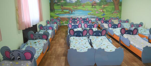 Спальня в детском саду Спальня в детском саду - Sputnik Узбекистан