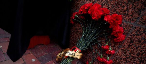 Память погибших в авиакатастрофе членов экипажа Boeing-737 почтили в Киеве - Sputnik Узбекистан