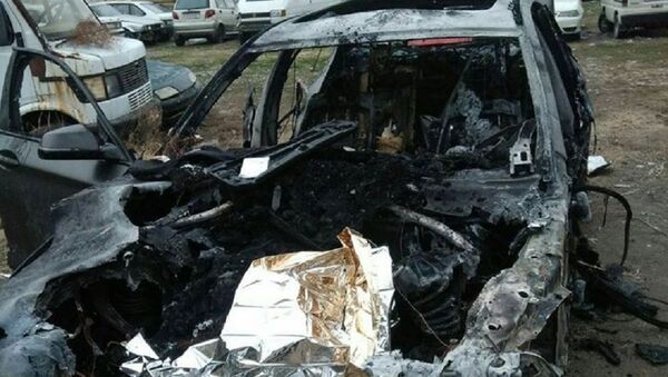 Сгоревший после аварии в Ташкенте автомобиль BMW - Sputnik Узбекистан
