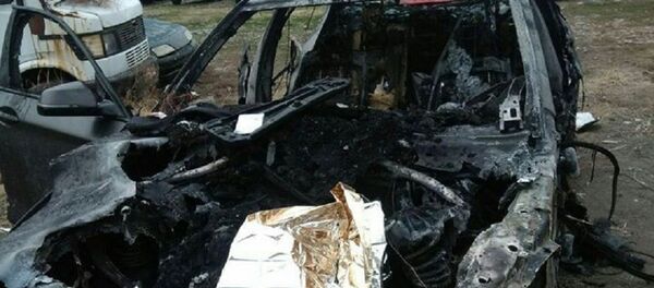 Сгоревший после аварии в Ташкенте автомобиль BMW Сгоревший после аварии в Ташкенте автомобиль BMW - Sputnik Ўзбекистон