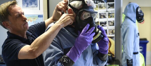 Сотрудники ОЗХО в штаб-квартире организации в Гааге, Нидерланды Сотрудники ОЗХО в штаб-квартире организации в Гааге, Нидерланды - Sputnik Ўзбекистон