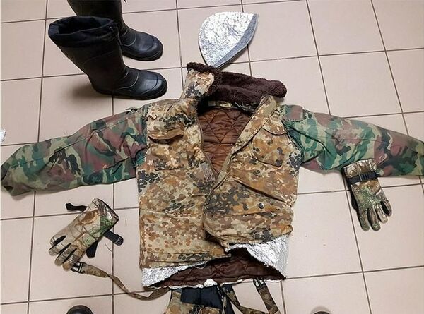 Узбекистанец попытался нелегально пересечь границу Литвы в шапочке из фольги Узбекистанец попытался нелегально пересечь границу Литвы в шапочке из фольги - Sputnik Узбекистан