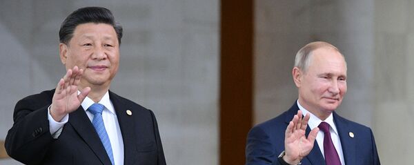 Президент РФ Владимир Путин и председатель Китайской Народной Республики (КНР) Си Цзиньпин Президент РФ Владимир Путин и председатель Китайской Народной Республики (КНР) Си Цзиньпин - Sputnik Ўзбекистон