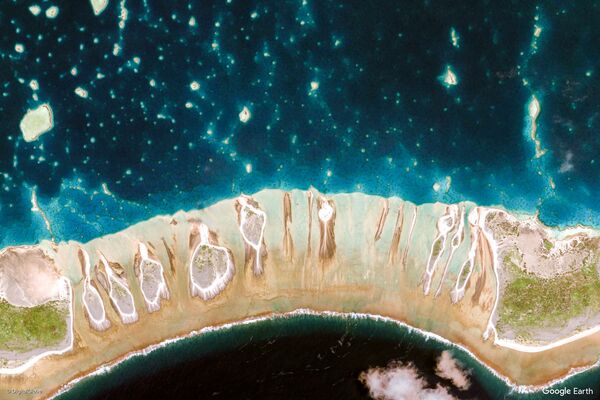 Изображение из космоса местности в районе островов Туамоту и Гамбье, Французская Полинезия - Sputnik Узбекистан