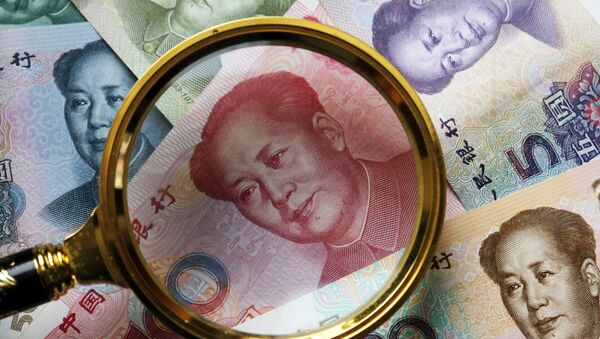 Китайские банкноты номиналом в 100, 50, 20,10 и 5 юаней. - Sputnik Ўзбекистон
