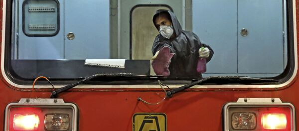 Дезинфекция поезда в Тегеране - Sputnik Ўзбекистон