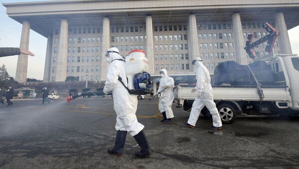 Profilakticheskiye merы protiv rasprostraneniya koronavirusa v Seule - Sputnik Oʻzbekiston