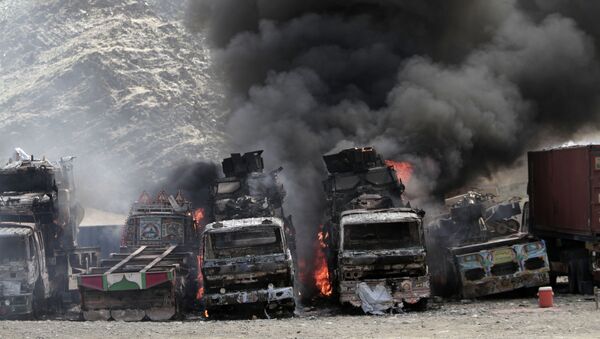 Avtomobili oxvachennie ognem v odnoy iz provinsiy Afganistana - Sputnik O‘zbekiston