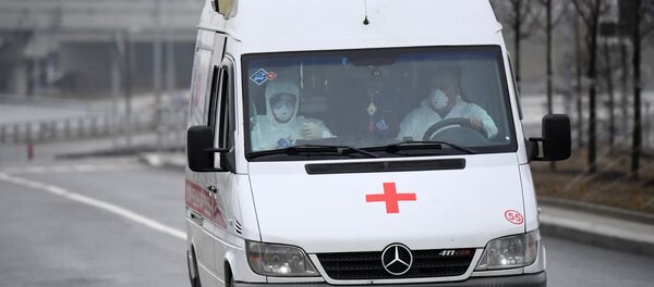 Медицинские работники в защитных костюмах. Архивное фото Медицинские работники в защитных костюмах. Архивное фото - Sputnik Ўзбекистон