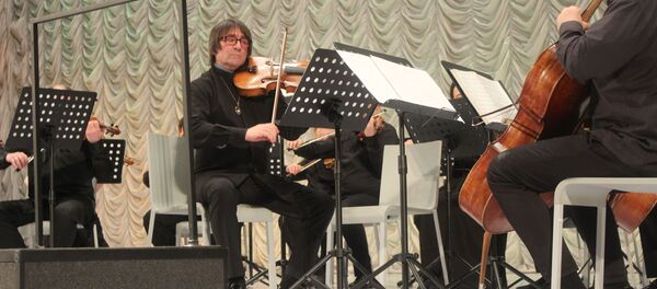 Дирижер и альтист, руководитель ансамбля Солисты Москвы Юрий Башмет - Sputnik Узбекистан