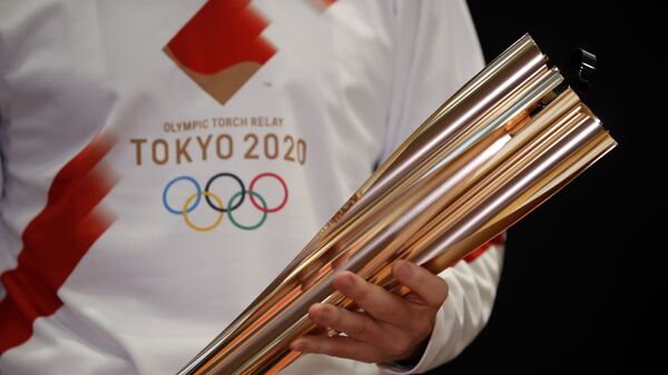 Факел Олимпийских игр 2020 года, которые пройдут в Токио - Sputnik Ўзбекистон