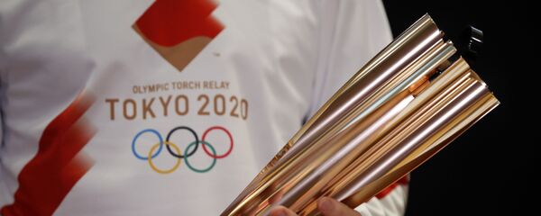 Факел Олимпийских игр 2020 года, которые пройдут в Токио - Sputnik Ўзбекистон