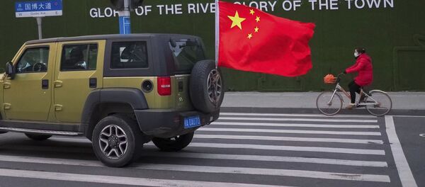 Улица города Ухань в китайской провинции Хубэй Улица города Ухань в китайской провинции Хубэй - Sputnik Ўзбекистон