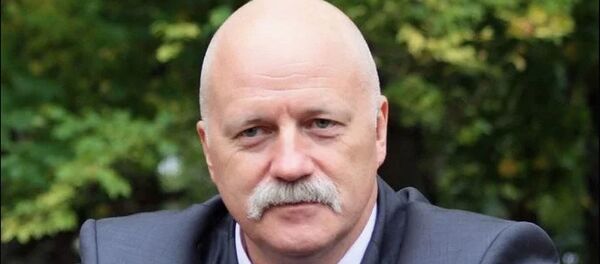 Аналитик группы компаний Финам Алексей Коренев - Sputnik Узбекистан