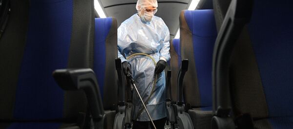 Санитарная обработка автобусов  - Sputnik Узбекистан