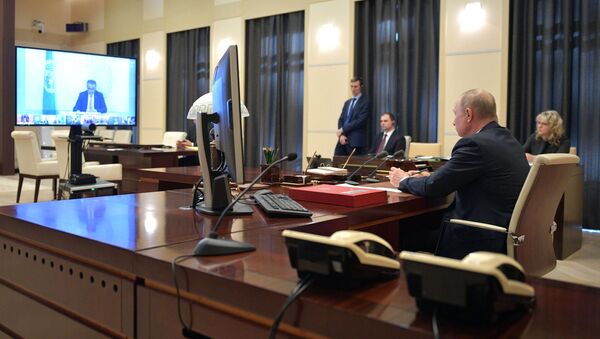 Президент РФ В. Путин принял участие в саммите лидеров Большой двадцатки по коронавирусу в режиме видеоконференции - Sputnik Ўзбекистон