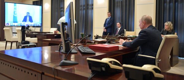 Президент РФ В. Путин принял участие в саммите лидеров Большой двадцатки по коронавирусу в режиме видеоконференции - Sputnik Ўзбекистон