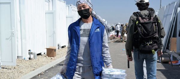 Тошкент вилояти Ўртасарой туманида хорижлан келган фуқаролар учун карантин ҳудуд ташкил қилинмоқда. Тошкент вилояти Ўртасарой туманида хорижлан келган фуқаролар учун карантин ҳудуд ташкил қилинмоқда. - Sputnik Ўзбекистон