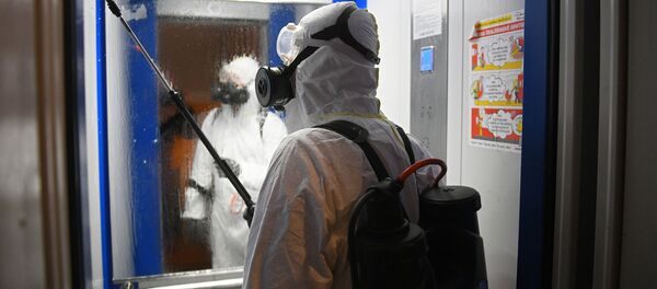 Дезинфекционная обработка лифта в жилом доме Дезинфекционная обработка лифта в жилом доме - Sputnik Ўзбекистон