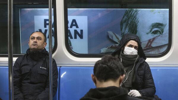 Пассажиры метро в масках в Стамбуле  - Sputnik Ўзбекистон