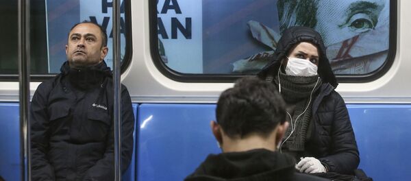 Пассажиры метро в масках в Стамбуле  Пассажиры метро в масках в Стамбуле  - Sputnik Ўзбекистон