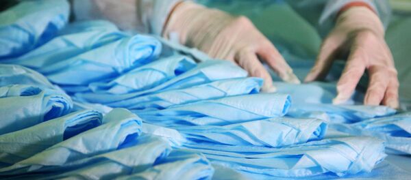 Изготовление медицинских средств защиты Изготовление медицинских средств защиты - Sputnik Ўзбекистон