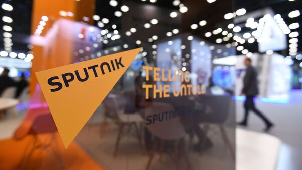 Стенд международного информационного агентства и радио Sputnik  - Sputnik Узбекистан