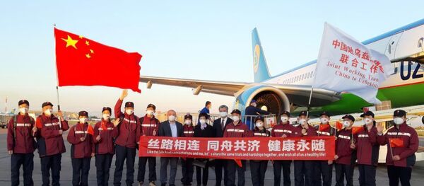 В Узбекистан из Китая прибыла группа медицинских экспертов В Узбекистан из Китая прибыла группа медицинских экспертов - Sputnik Ўзбекистон