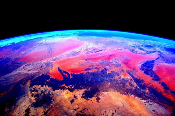 Снимок Земли из космоса, сделанный астронавтом Скоттом Келли с борта МКС - Sputnik Узбекистан