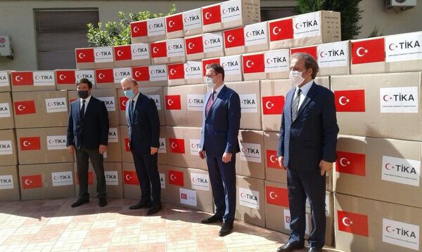 Агентство TIKA передала медикам Узбекистана 5 тысяч комплектов средств защиты Агентство TIKA передала медикам Узбекистана 5 тысяч комплектов средств защиты - Sputnik Узбекистан