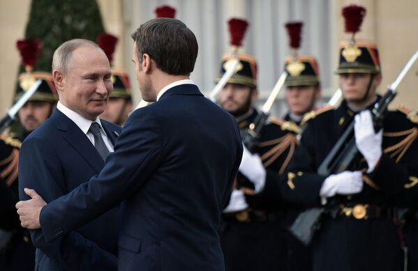 Vladimir Putin va Emmanuel Makron, 2019-yil 9-dekabr.  - Sputnik O‘zbekiston