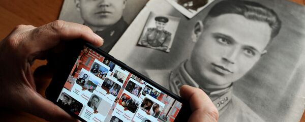 Aksiya Bessmertniy polk v gorodax Rossii Aksiya Bessmertniy polk v gorodax Rossii - Sputnik O‘zbekiston