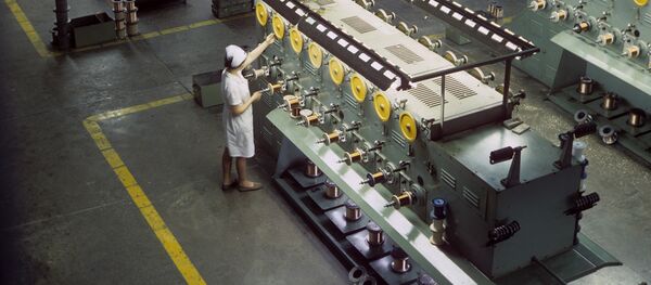 В одном из цехов кабельного завода В одном из цехов кабельного завода - Sputnik Узбекистан