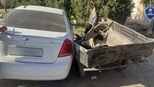 Автомобиль и мотороллер столкнулись лоб в лоб в Сурхандарье - Sputnik Узбекистан