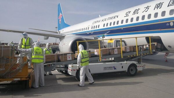 В Узбекистан доставлена часть гуманитарного груза из Китая для борьбы с коронавирусом - Sputnik Узбекистан