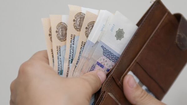 Национальная валюта Узбекистана — сум. Иллюстративное фото - Sputnik Узбекистан
