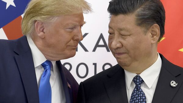 Президент США Дональд Трамп и председатель КНР Си Цзиньпин в ходе встречи на саммите G20 в Осаке. 29 июня 2019 - Sputnik Узбекистан