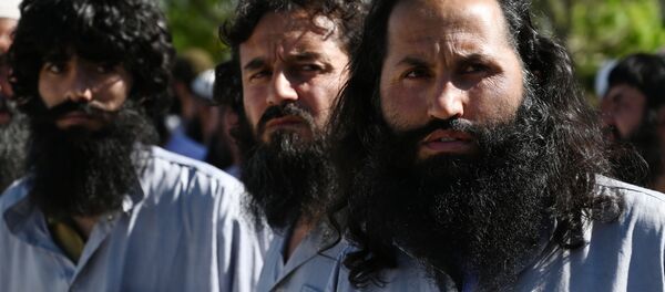 Заключенные талибы во время их освобождения из тюрьмы Баграм, Афганистан Заключенные талибы во время их освобождения из тюрьмы Баграм, Афганистан - Sputnik Ўзбекистон